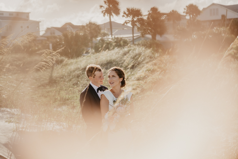 Stunning bride and groom beach wedding portraits in Folly Beach, South Carolina by Britney Clause Photography