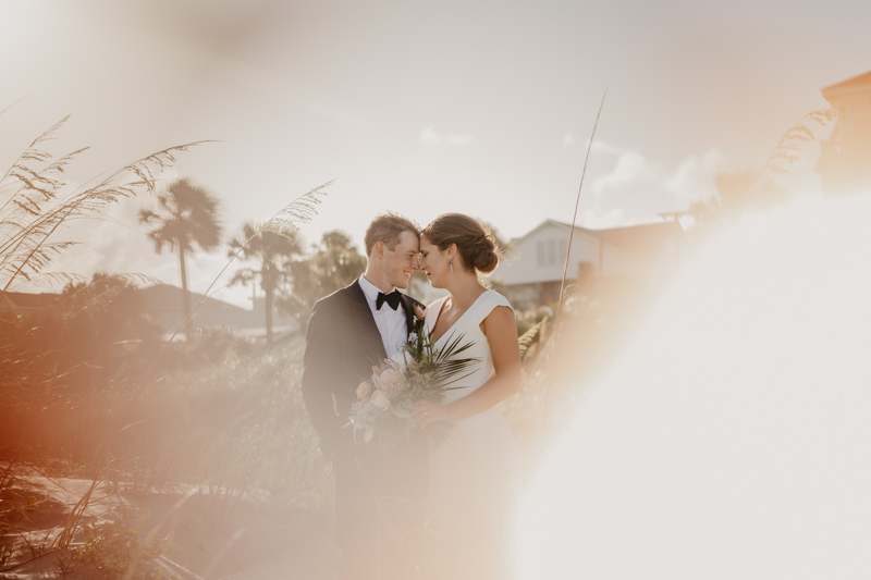 Stunning bride and groom beach wedding portraits in Folly Beach, South Carolina by Britney Clause Photography