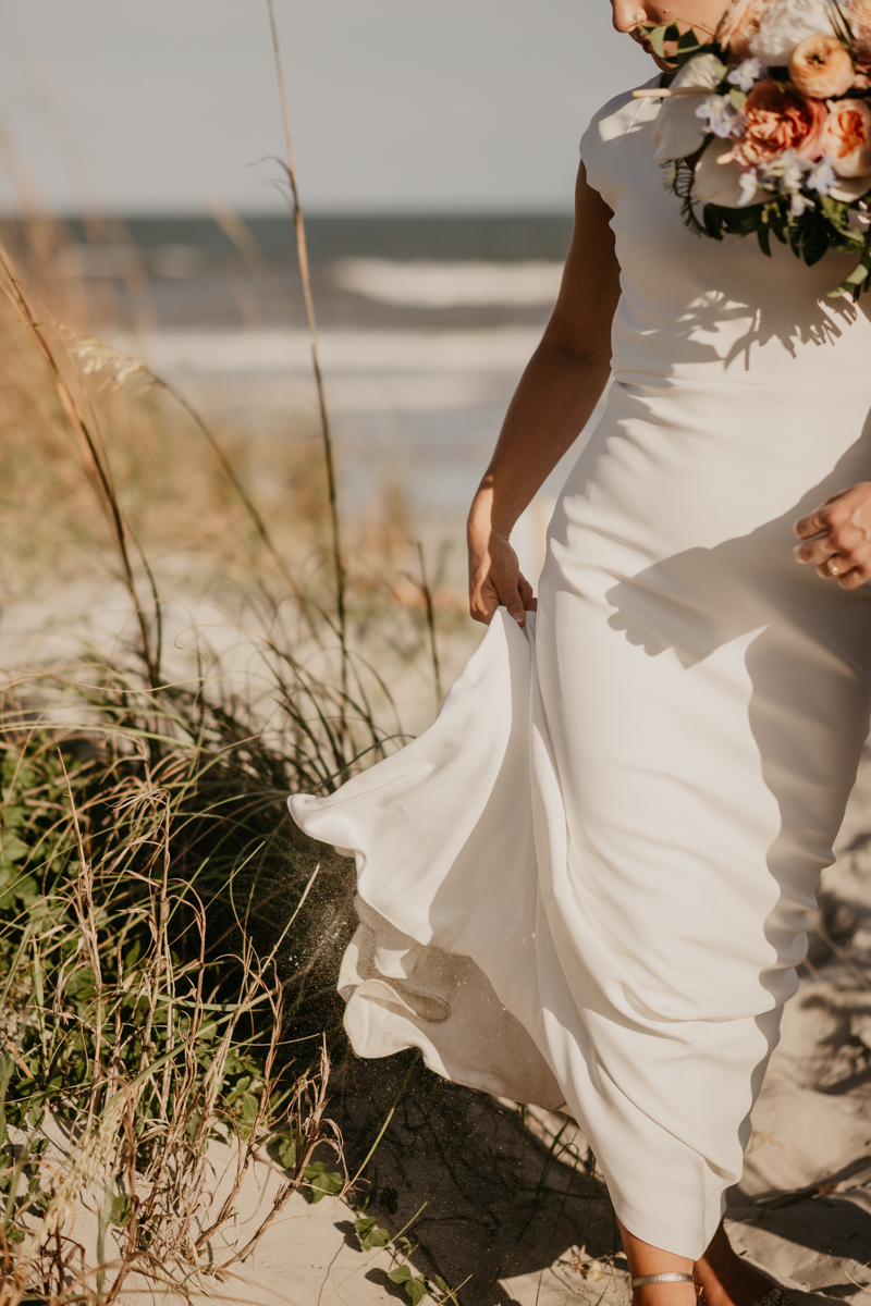 Stunning bride and groom beach wedding portraits in Folly Beach, South Carolina by Britney Clause Photography