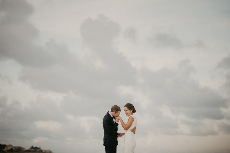 Stunning bride and groom beach wedding portraits in Folly Beach, South Carolina by Britney Clause Photography