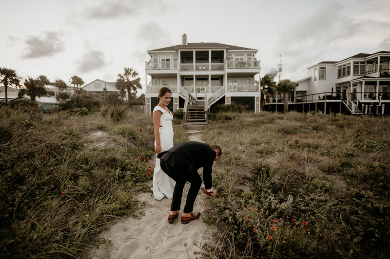 Stunning bride and groom beach wedding portraits in Folly Beach, South Carolina by Britney Clause Photography