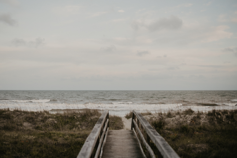 Stunning bride and groom beach wedding portraits in Folly Beach, South Carolina by Britney Clause Photography