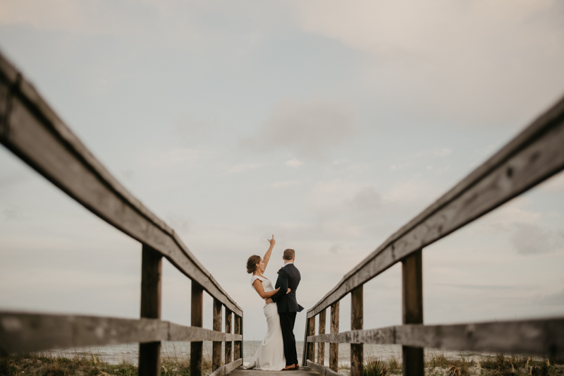 Stunning bride and groom beach wedding portraits in Folly Beach, South Carolina by Britney Clause Photography