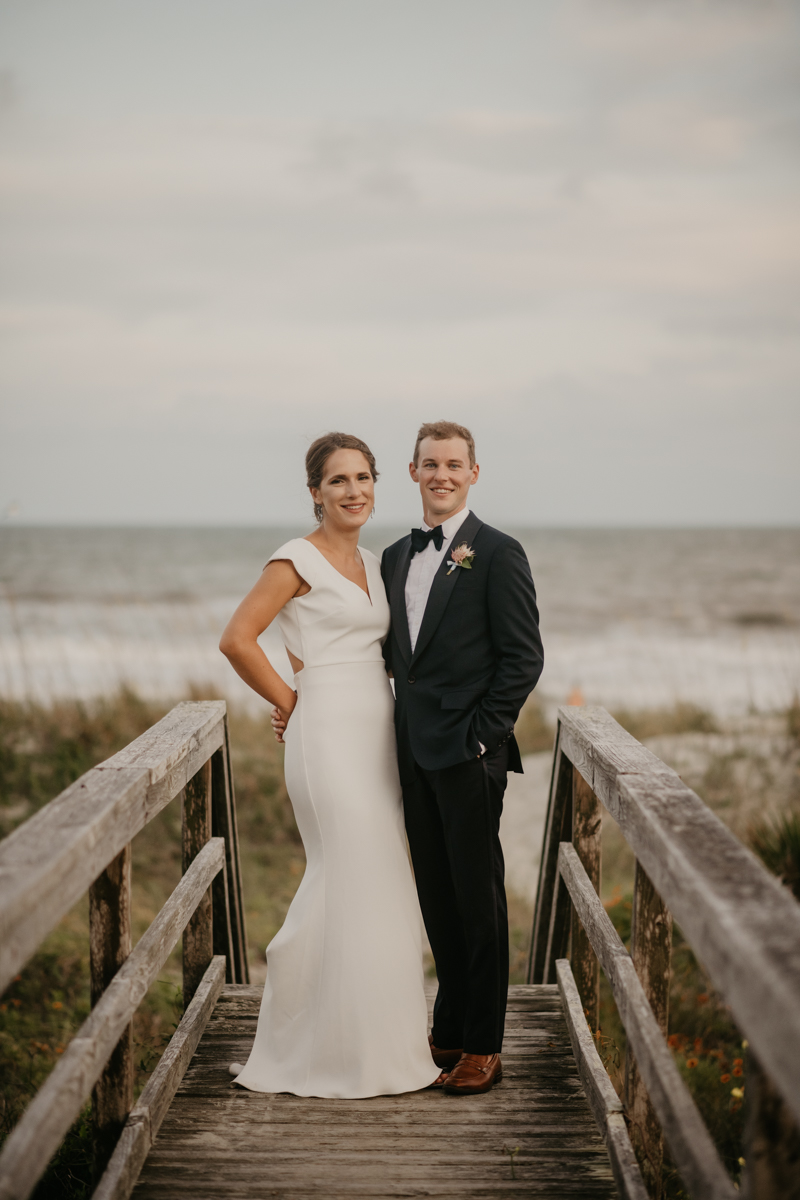 Stunning bride and groom beach wedding portraits in Folly Beach, South Carolina by Britney Clause Photography