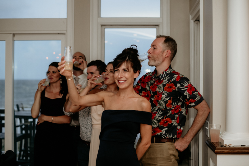 A fun beach wedding reception in Folly Beach, South Carolina by Britney Clause Photography