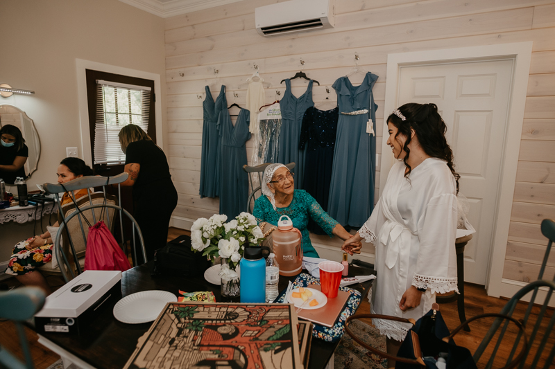 A bride getting ready for her wedding at Historic Rosemont Springs, Virginia by Britney Clause Photography