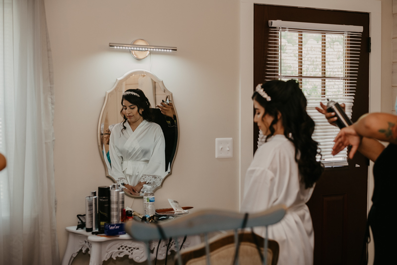 A bride getting ready for her wedding at Historic Rosemont Springs, Virginia by Britney Clause Photography