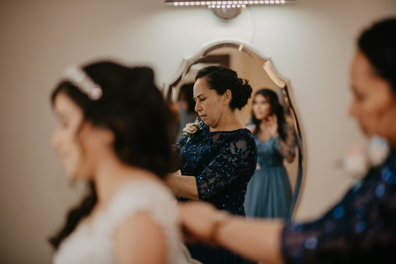 A bride getting ready for her wedding at Historic Rosemont Springs, Virginia by Britney Clause Photography