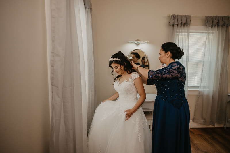 A bride getting ready for her wedding at Historic Rosemont Springs, Virginia by Britney Clause Photography