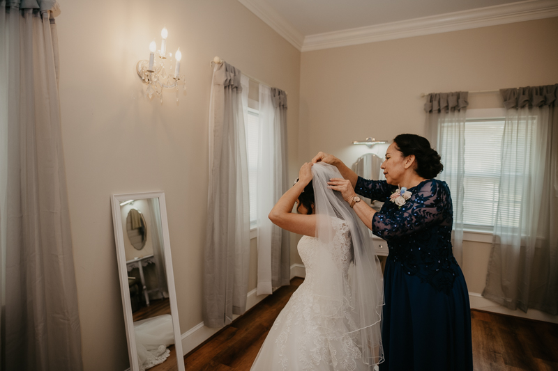 A bride getting ready for her wedding at Historic Rosemont Springs, Virginia by Britney Clause Photography