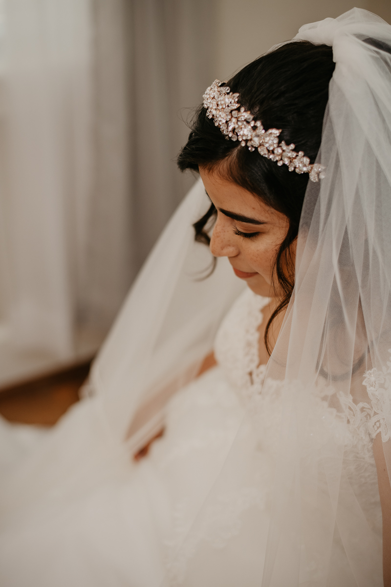 A bride getting ready for her wedding at Historic Rosemont Springs, Virginia by Britney Clause Photography