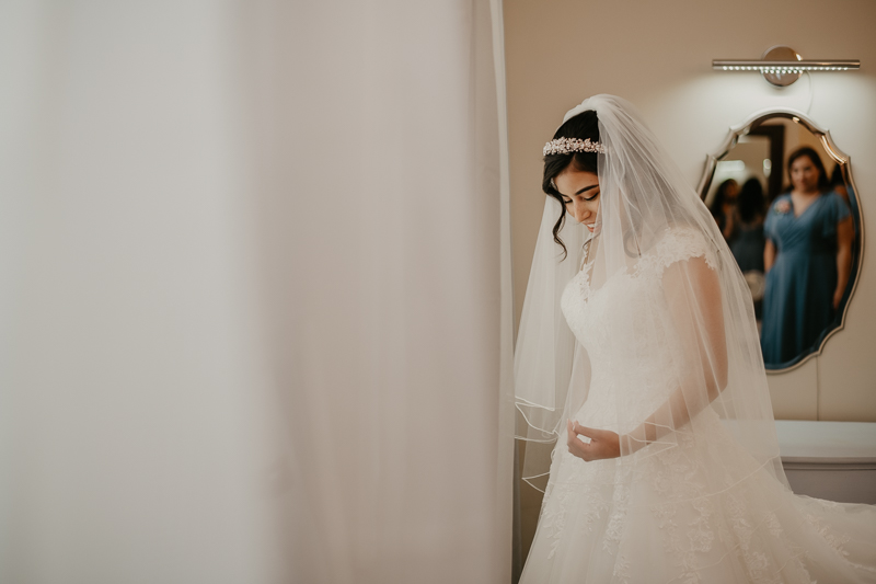 A bride getting ready for her wedding at Historic Rosemont Springs, Virginia by Britney Clause Photography