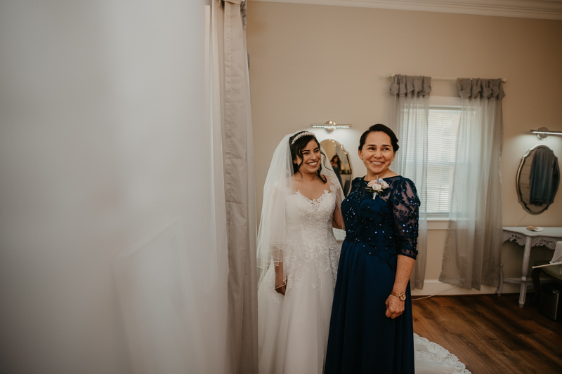 A bride getting ready for her wedding at Historic Rosemont Springs, Virginia by Britney Clause Photography