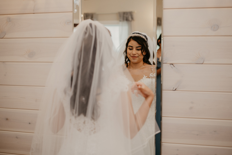 A bride getting ready for her wedding at Historic Rosemont Springs, Virginia by Britney Clause Photography