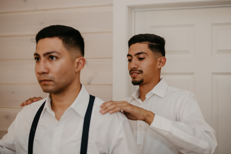 A groom getting ready for his wedding at Historic Rosemont Springs, Virginia by Britney Clause Photography