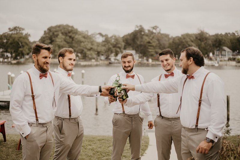 A groom getting ready for his wedding at The Anchor Inn in Pasadena, Maryland by Britney Clause Photography