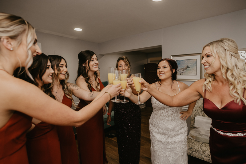 A bride getting ready for her wedding at The Anchor Inn in Pasadena, Maryland by Britney Clause Photography