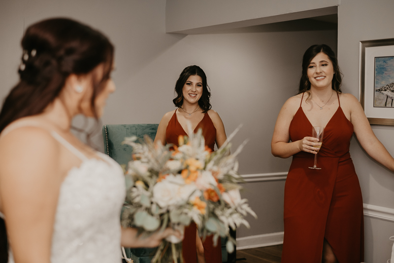 A bride getting ready for her wedding at The Anchor Inn in Pasadena, Maryland by Britney Clause Photography