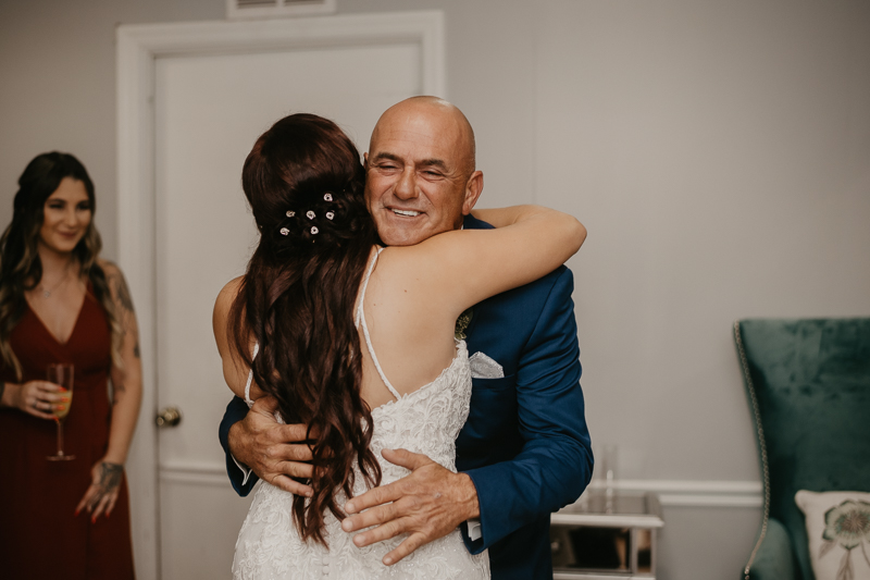 A bride getting ready for her wedding at The Anchor Inn in Pasadena, Maryland by Britney Clause Photography