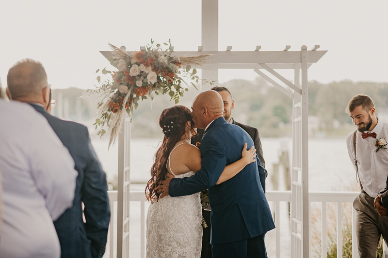 Amazing waterfront wedding ceremony at The Anchor Inn in Pasadena, Maryland by Britney Clause Photography