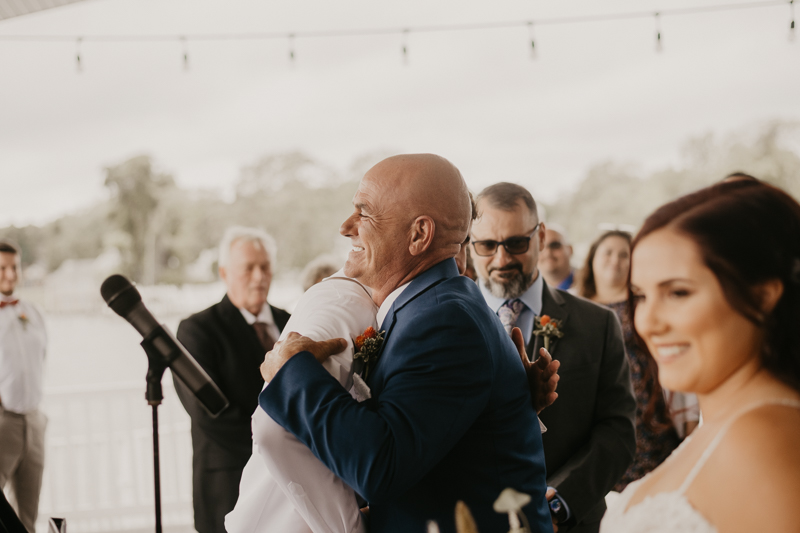 Amazing waterfront wedding ceremony at The Anchor Inn in Pasadena, Maryland by Britney Clause Photography