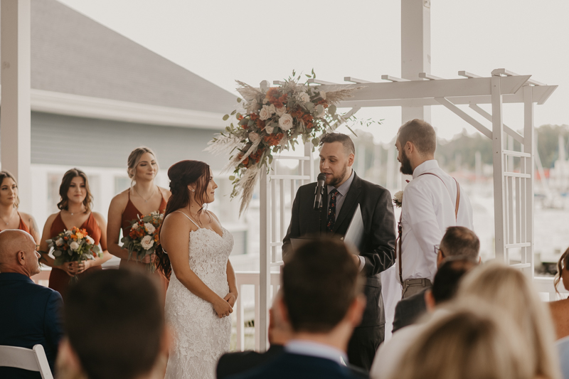 Amazing waterfront wedding ceremony at The Anchor Inn in Pasadena, Maryland by Britney Clause Photography