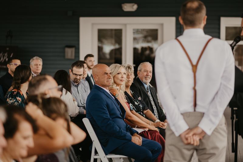 Amazing waterfront wedding ceremony at The Anchor Inn in Pasadena, Maryland by Britney Clause Photography