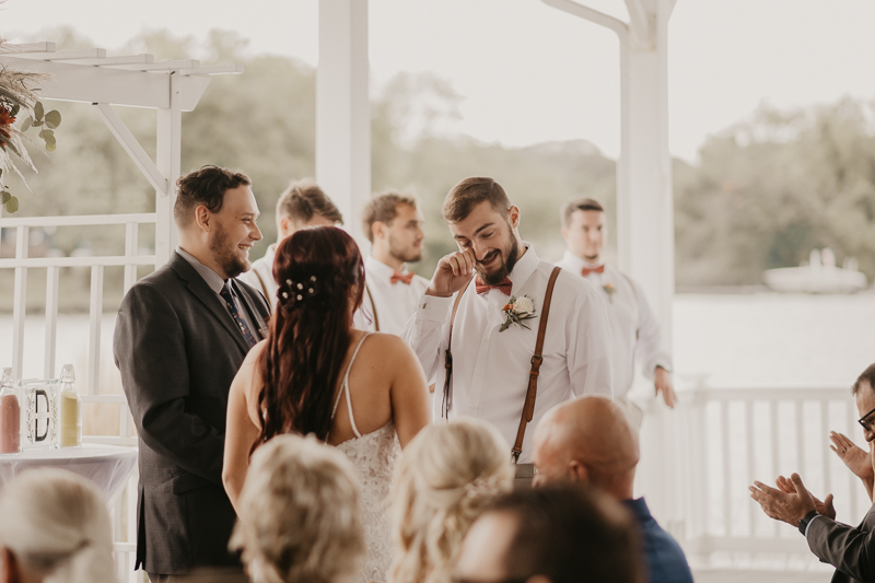 Amazing waterfront wedding ceremony at The Anchor Inn in Pasadena, Maryland by Britney Clause Photography