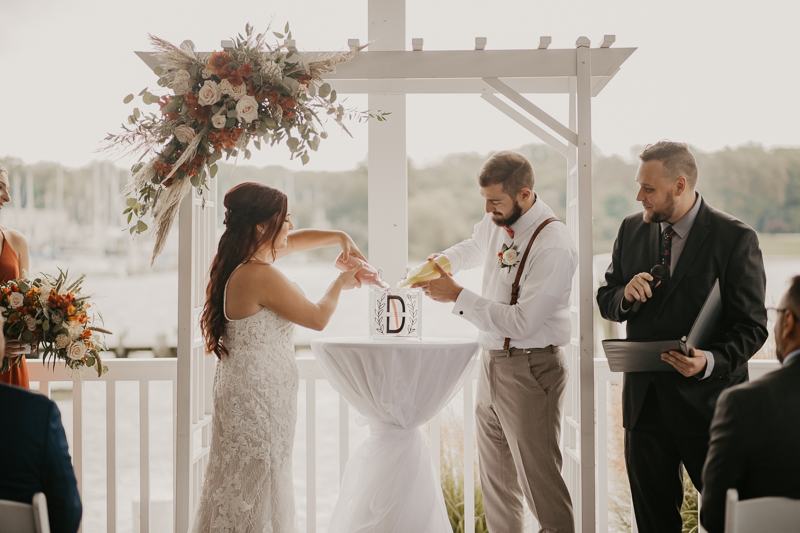 Amazing waterfront wedding ceremony at The Anchor Inn in Pasadena, Maryland by Britney Clause Photography