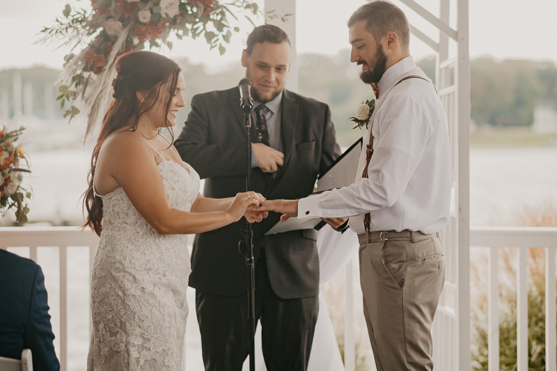 Amazing waterfront wedding ceremony at The Anchor Inn in Pasadena, Maryland by Britney Clause Photography