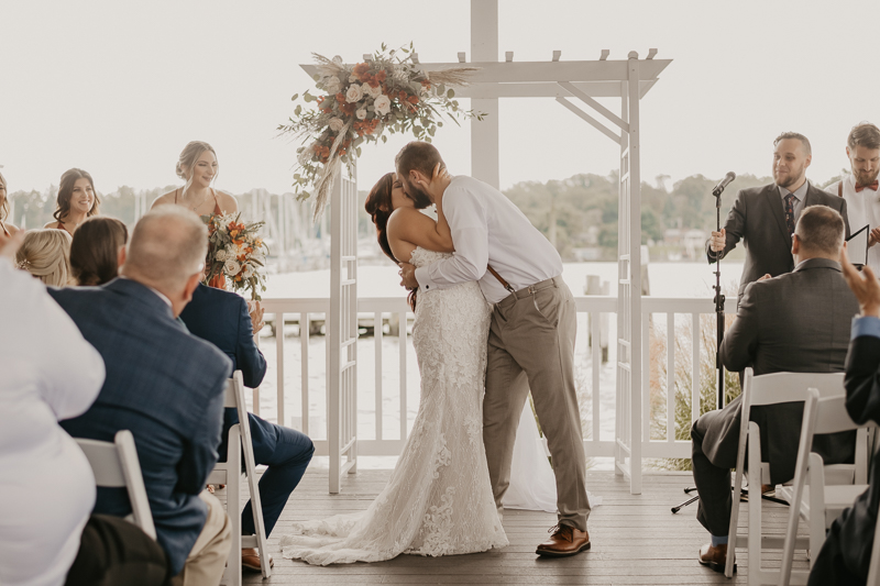 Amazing waterfront wedding ceremony at The Anchor Inn in Pasadena, Maryland by Britney Clause Photography