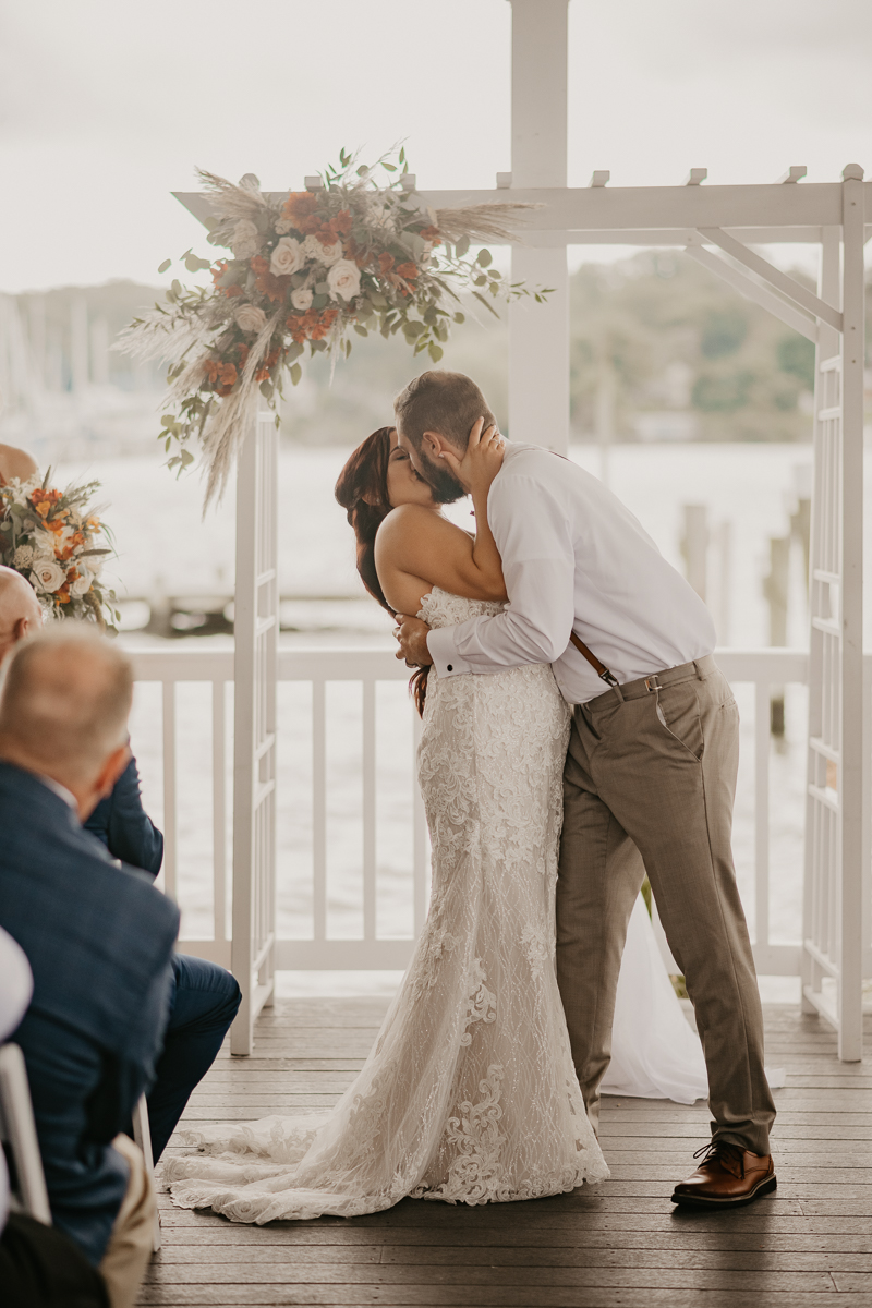 Amazing waterfront wedding ceremony at The Anchor Inn in Pasadena, Maryland by Britney Clause Photography