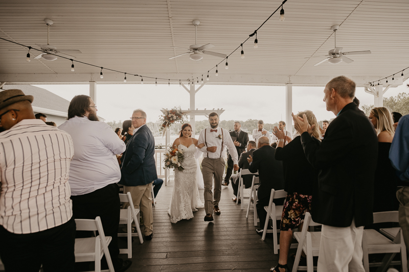 Amazing waterfront wedding ceremony at The Anchor Inn in Pasadena, Maryland by Britney Clause Photography