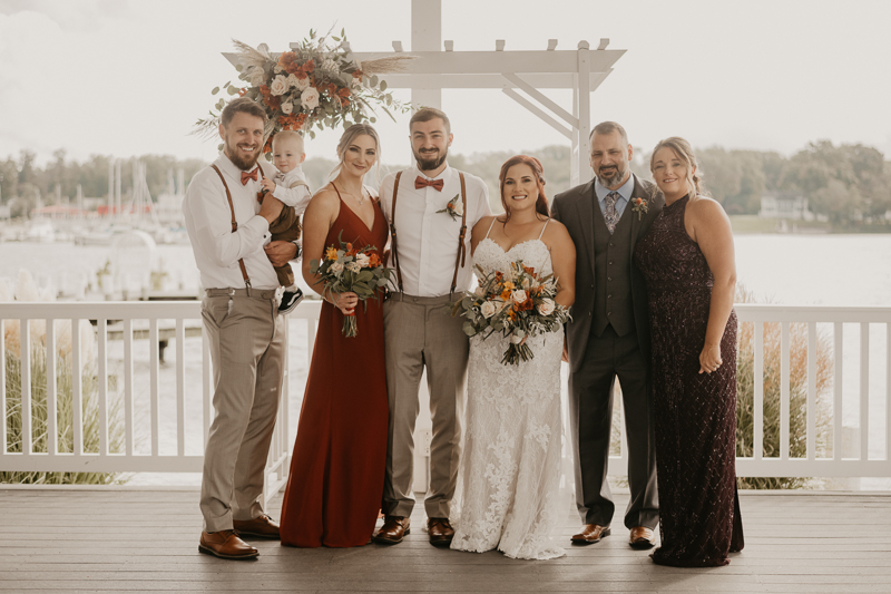 Amazing waterfront wedding ceremony at The Anchor Inn in Pasadena, Maryland by Britney Clause Photography