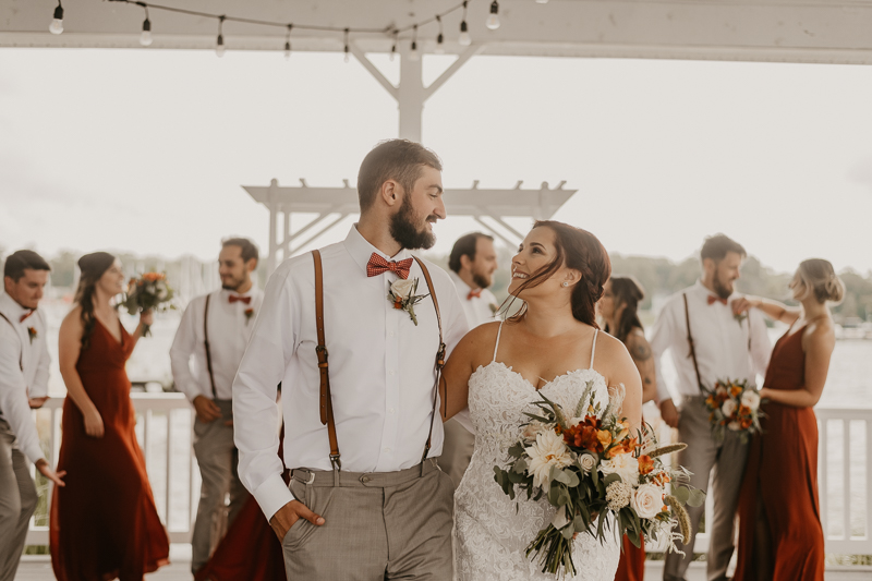 Amazing waterfront wedding ceremony at The Anchor Inn in Pasadena, Maryland by Britney Clause Photography