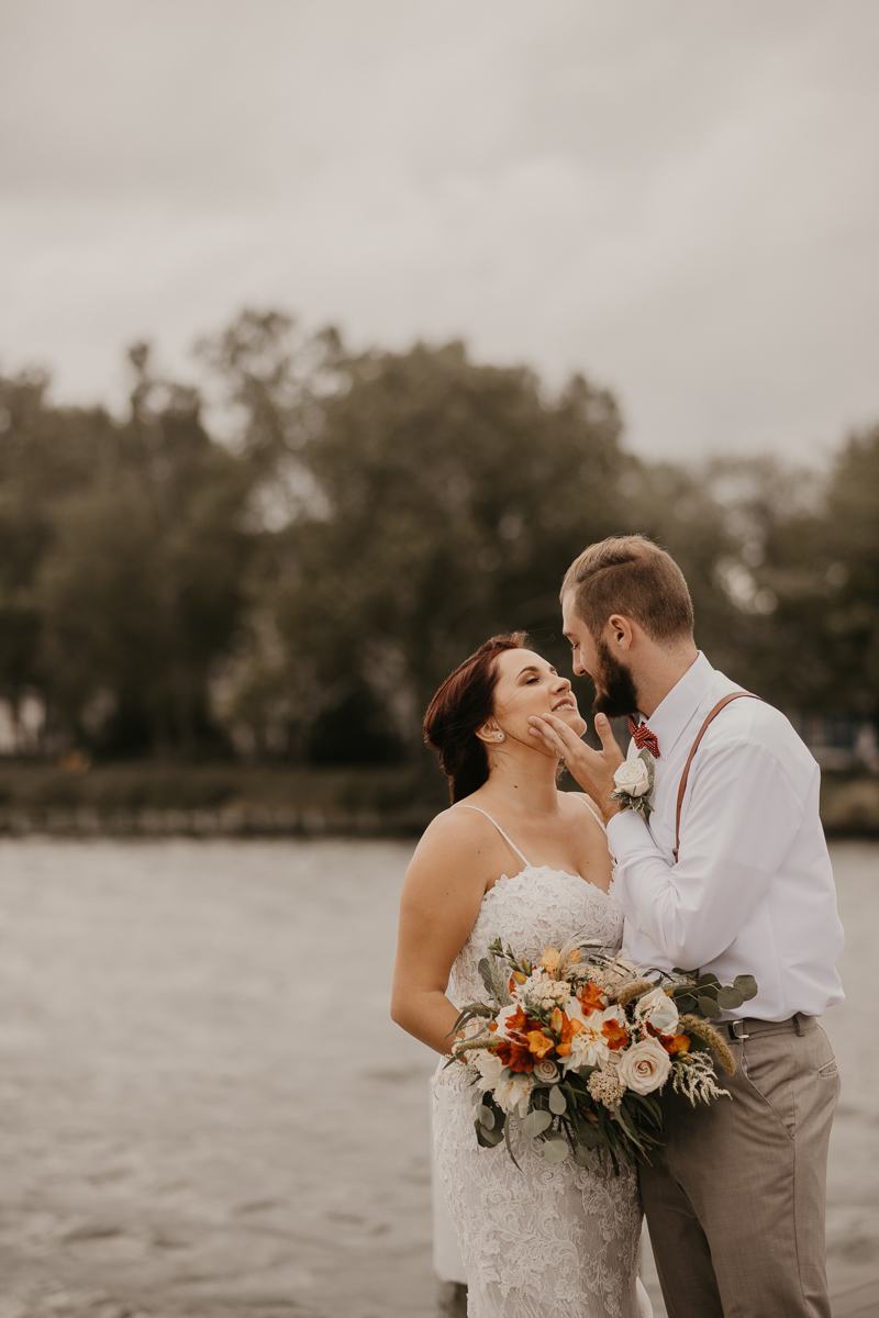 Stunning bride and groom wedding portraits at The Anchor Inn in Pasadena, Maryland by Britney Clause Photography