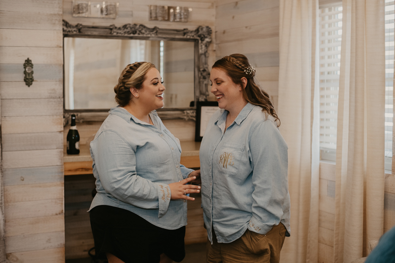 A bride getting ready for her wedding at Kylan Barn in Delmar, Maryland by Britney Clause Photography