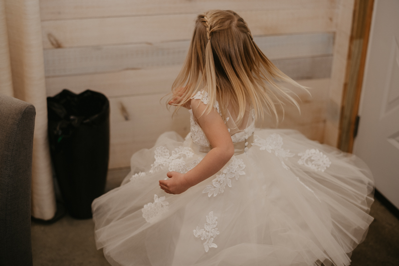 A bride getting ready for her wedding at Kylan Barn in Delmar, Maryland by Britney Clause Photography