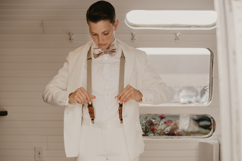 A bride getting ready for her wedding at Kylan Barn in Delmar, Maryland by Britney Clause Photography