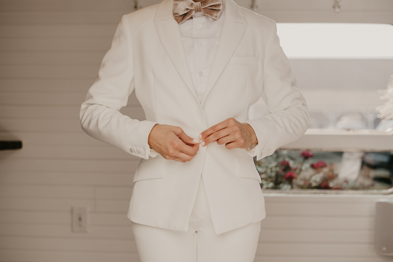 A bride getting ready for her wedding at Kylan Barn in Delmar, Maryland by Britney Clause Photography