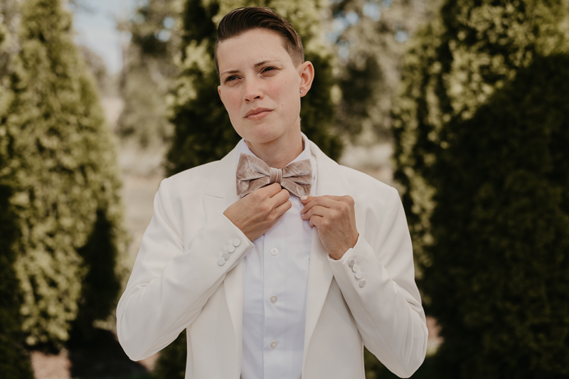 A bride getting ready for her wedding at Kylan Barn in Delmar, Maryland by Britney Clause Photography