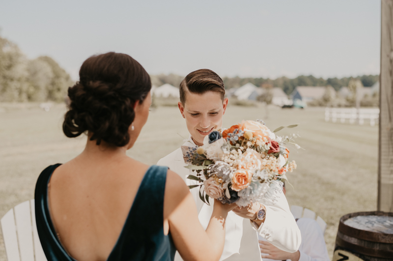 A bride getting ready for her wedding at Kylan Barn in Delmar, Maryland by Britney Clause Photography