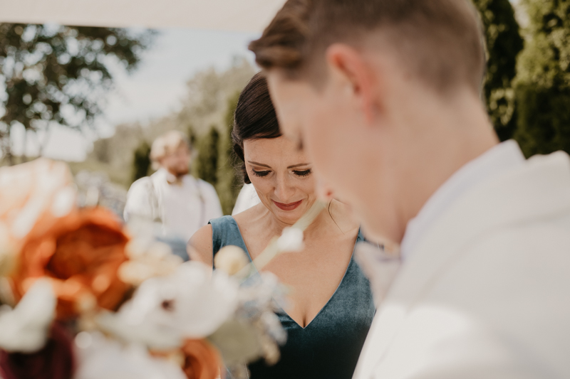 A bride getting ready for her wedding at Kylan Barn in Delmar, Maryland by Britney Clause Photography