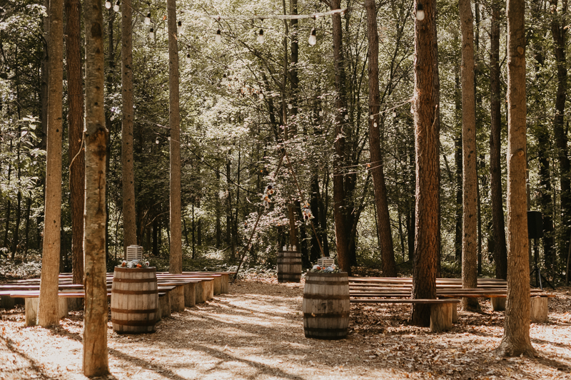 Amazing same sex wedding ceremony in the woods at Kylan Barn in Delmar, Maryland by Britney Clause Photography