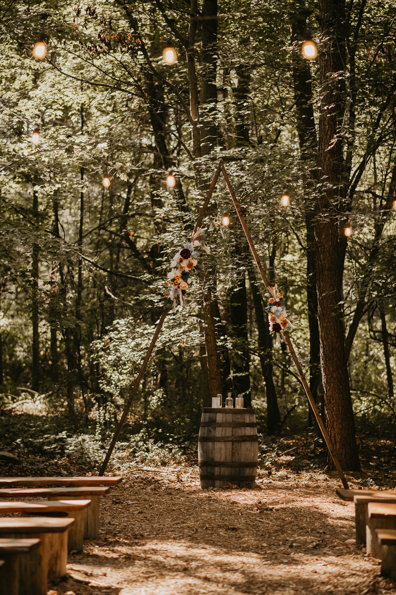 Amazing same sex wedding ceremony in the woods at Kylan Barn in Delmar, Maryland by Britney Clause Photography