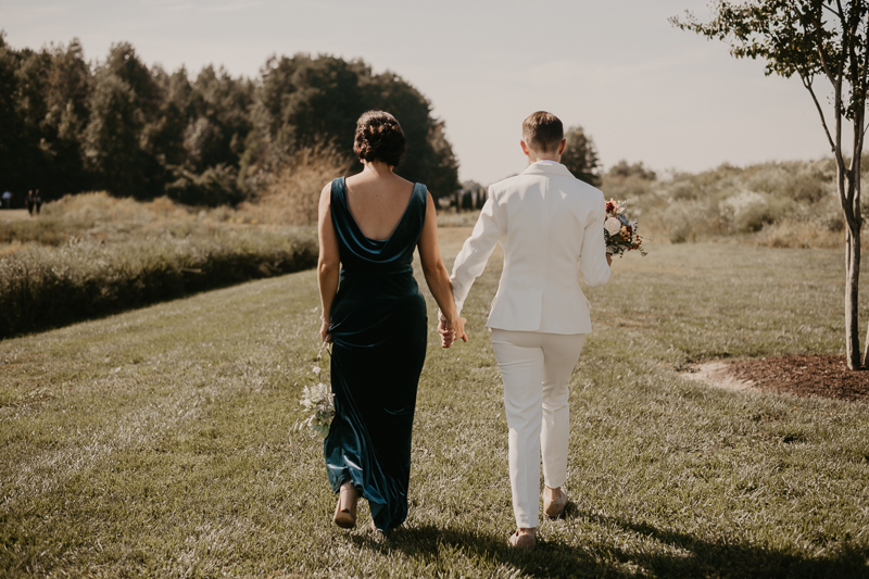 Amazing same sex wedding ceremony in the woods at Kylan Barn in Delmar, Maryland by Britney Clause Photography