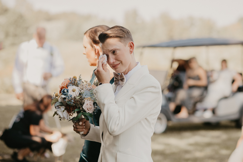 Amazing same sex wedding ceremony in the woods at Kylan Barn in Delmar, Maryland by Britney Clause Photography