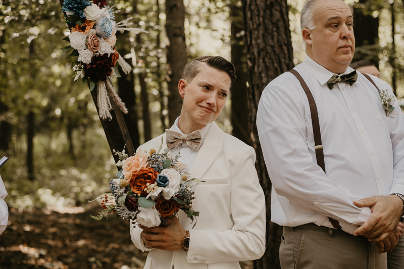 Amazing same sex wedding ceremony in the woods at Kylan Barn in Delmar, Maryland by Britney Clause Photography