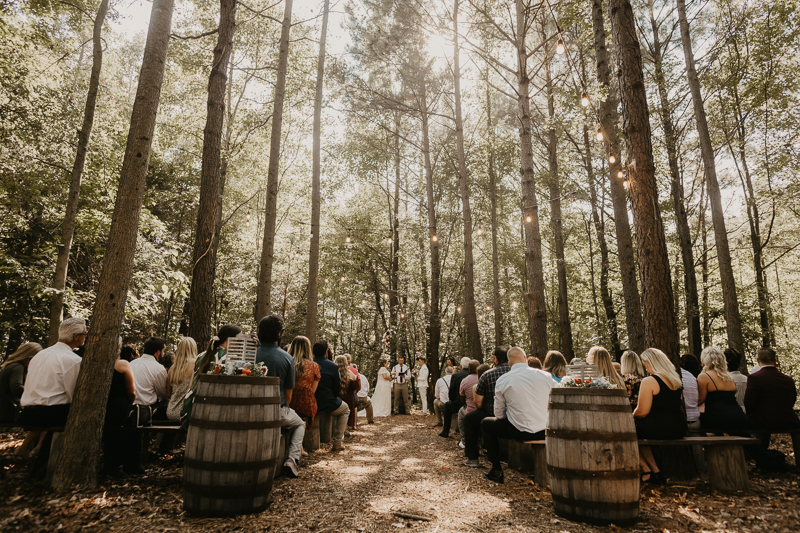 Amazing same sex wedding ceremony in the woods at Kylan Barn in Delmar, Maryland by Britney Clause Photography