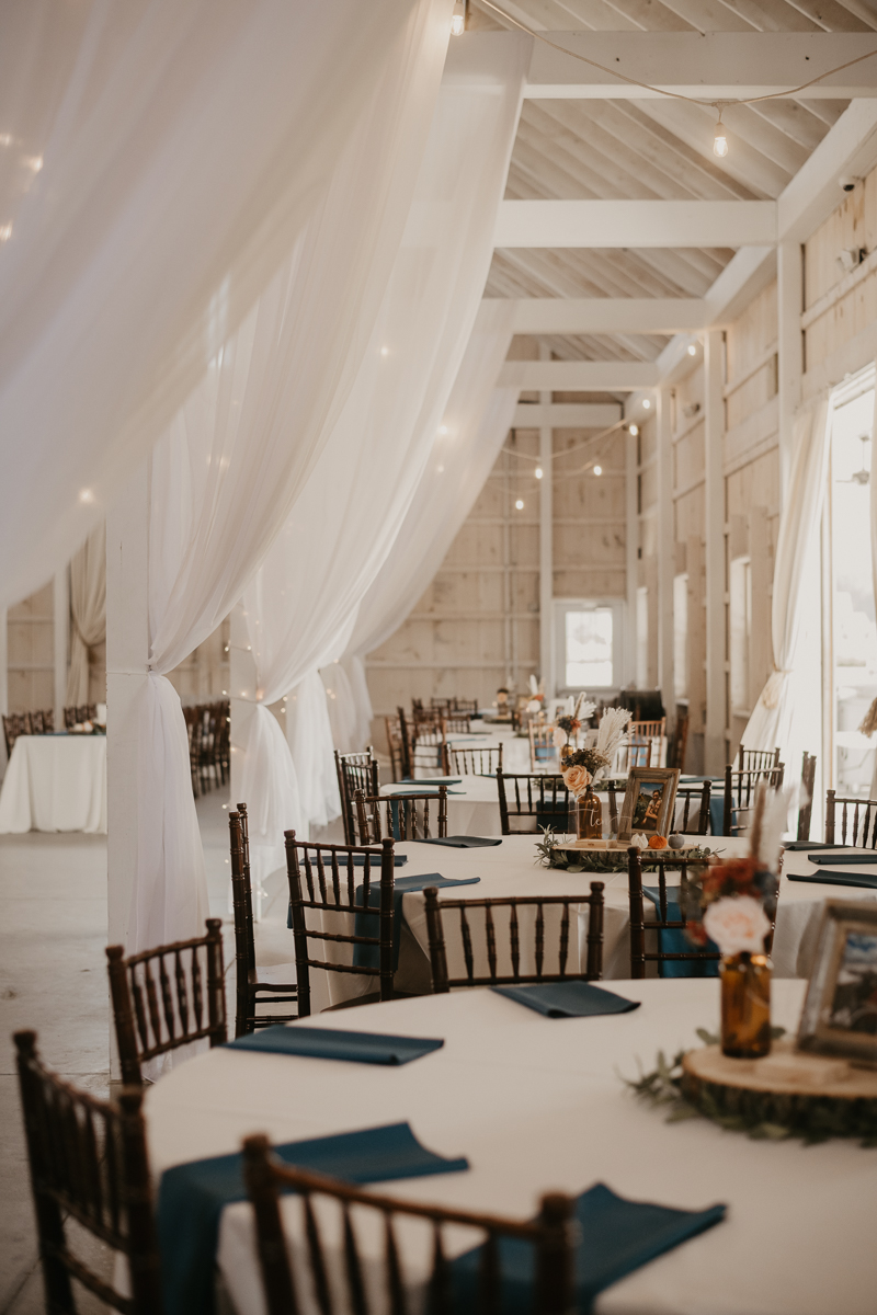 Magical DIY wedding reception decor at Kylan Barn in Delmar, Maryland by Britney Clause Photography
